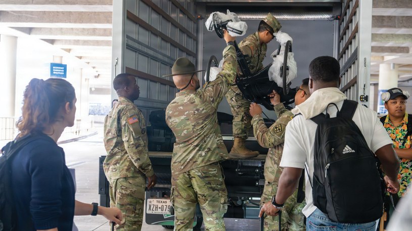 Team Army competitors load their competitor equipment into a box truck after arriving at San Antonio International Airport ahead of the 2026 Warrior Games June 8, 2026. Team Army will compete with men and women from other sister services in adaptive sporting events throughout the Games. (U.S. Army photo by Sgt. Pomare Te’o Jr.)