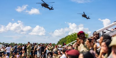 Soldiers assigned to 7th Special Forces Group (Airborne), or 7th SFG(A), family members and community members watch a capabilities exercise (CAPEX) following the opening ceremony of Red Empire Week 2026 at Camp “Bull” Simons, Fla., June 8, 2026.