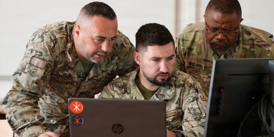 Armed Forces of Bosnia and Herzegovina Capt. Armin Kolašinac and Capt. Mirza Drndo, vulnerability assessment officers at the Cyber Operations Center, and Maryland Army National Guard Sgt. First Class Chris Williams, a cyber network non-commissioned officer assigned to Cyber Protection Team 169, identify a threat during Combined Adriatic Cyber Endeavor 2026 at the Petar Zrinski Barracks, June 8, 2026.