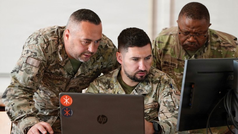 Armed Forces of Bosnia and Herzegovina Capt. Armin Kolašinac and Capt. Mirza Drndo, vulnerability assessment officers at the Cyber Operations Center, and Maryland Army National Guard Sgt. First Class Chris Williams, a cyber network non-commissioned officer assigned to Cyber Protection Team 169, identify a threat during Combined Adriatic Cyber Endeavor 2026 at the Petar Zrinski Barracks, June 8, 2026.