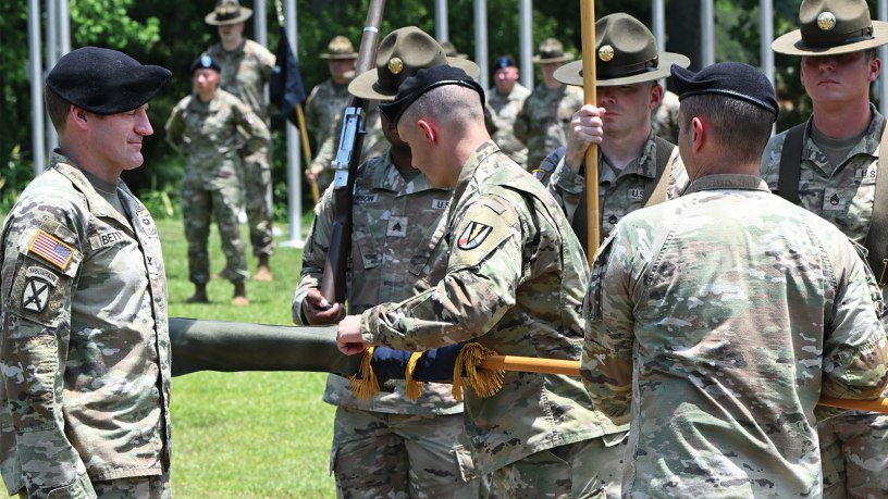 Col. Joshua Betty, 165th Infantry Brigade commander, looks on as the 2nd Battalion, 39th Infantry Regiment colors are encased during a ceremony held June 9.