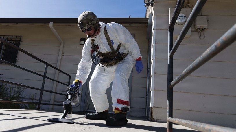 Maj. Daniel S. Godlasky, a nuclear operations officer with the 20th Chemical, Biological Radiological, Nuclear, Explosives (CBRNE) Command, collects simulated nuclear debris during Exercise Prominent Hunt in the Colorado Springs, Colorado area June 8 – 12.