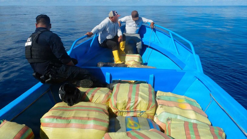 A Coast Guard cutter Bear boarding team interdicts a suspected drug-smuggling vessel in the Eastern Pacific Ocean, June 11, 2026. The Bear and an embarked Helicopter Interdiction Tactical Squadron aviation detachment interdicted the vessel, seizing approximately 4,000 pounds of marijuana.