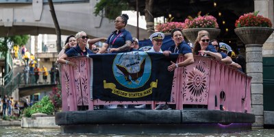 Competitors with the U.S. Navy Warrior Games team ride on a river boat in the San Antonio riverwalk during the Warrior Games. The Warrior Games recognize the critical role families, caregivers, and supporters play in each competitor’s recovery journey.