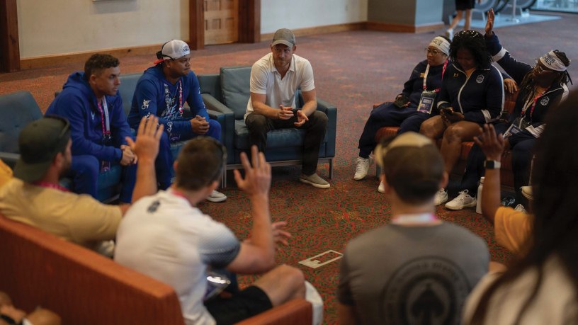 Prince Harry, Duke of Sussex, sits and talks with competitors partaking in the Warrior Games. The Warrior Games bring together competitors from across the military community to strengthen bonds through shared experiences and adaptive competition. The Warrior Games celebrate the determination, strength, and resilience of wounded, ill, and injured service members and veterans.