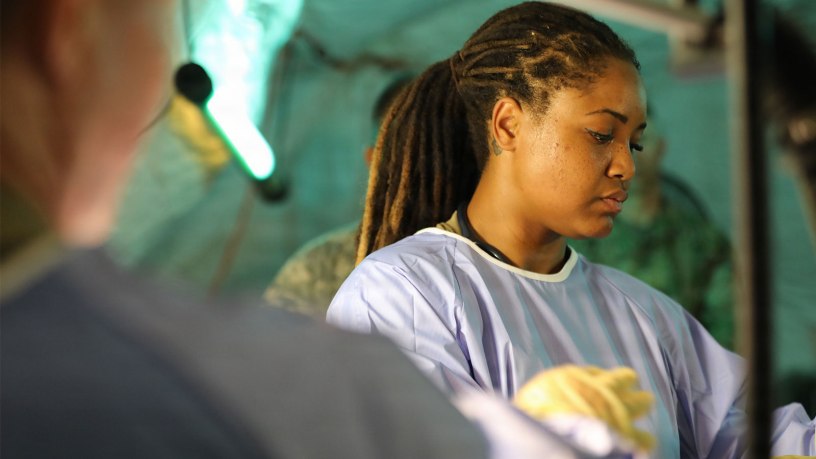 Sgt. Raijuenae Aravena, an animal care specialist assigned to the 422nd Medical Detachment Veterinary Service Support (MDVS), 338th Medical Brigade, took part in a simulated medical procedure on a mechanical dog during Operation Sentinel Justice at Camp Shelby, Mississippi, June 14, 2026.