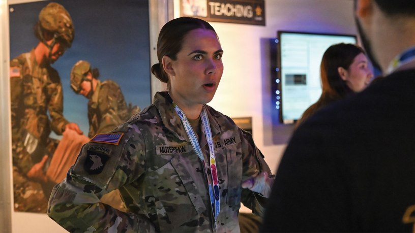 U.S. Army Reserve Sgt. Abbie Muterspaw, a combat medic with the 932nd Forward Resuscitative Surgical Detachment of Indianapolis, talks with students in the Mobile Medical Experience trailer at the Health Occupations Students of America Future Health Professionals International Leadership Conference, here on June 16, 2026.