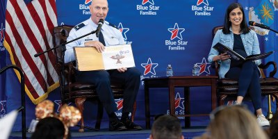 Col. Edward Szczepanik, 6th Air Refueling Wing commander, and the Second Lady of the United States Usha Vance, read to military-connected children and their families during a Blue Star Books event at MacDill Air Force Base, Fla., June 16, 2026. One hundred twenty five children of military members received books during the event in support of the Second Lady’s 2026 Summer Reading Challenge. (U.S. Air Force photo by Airman 1st Class Nelvis Sera)