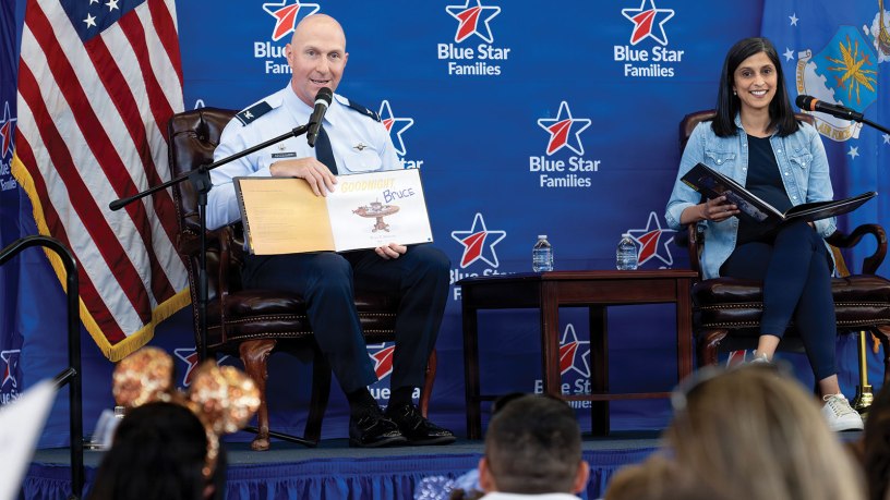 Col. Edward Szczepanik, 6th Air Refueling Wing commander, and the Second Lady of the United States Usha Vance, read to military-connected children and their families during a Blue Star Books event at MacDill Air Force Base, Fla., June 16, 2026. One hundred twenty five children of military members received books during the event in support of the Second Lady’s 2026 Summer Reading Challenge. (U.S. Air Force photo by Airman 1st Class Nelvis Sera)