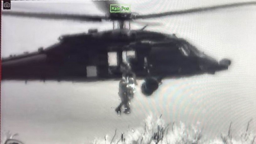 A U.S. Army HH-60M Black Hawk medical evacuation helicopter crew assigned to Joint Task Force-Southern Border in support of Operation Ardent Vanguard prepares to transport an injured civilian during an aeromedical evacuation in a remote mountainous area of southern Arizona, June 17, 2026.