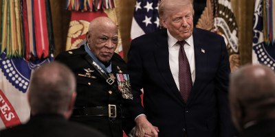 Retired U.S. Marine Corps Maj. James Capers poses for photo with the 47th President of the United States, Donald J. Trump, after receiving the Medal of Honor during an award ceremony at the White House, Washington, D.C., June 18, 2026.