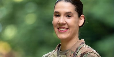 Warrant Officer 1 Ashley Hripak poses for a portrait outside of the William A. O'Neill Armory in Hartford, Connecticut on June 24, 2026.(U.S. Army National Guard Photo by Spc. Emmanuel Gibson)