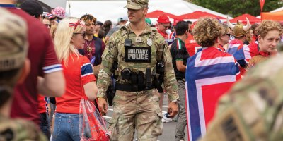 A Soldier from the 972nd Military Police Company, Massachusetts National Guard, walks through the fan experience zone at Boston Stadium before a FIFA World Cup game, June 26, 2026.