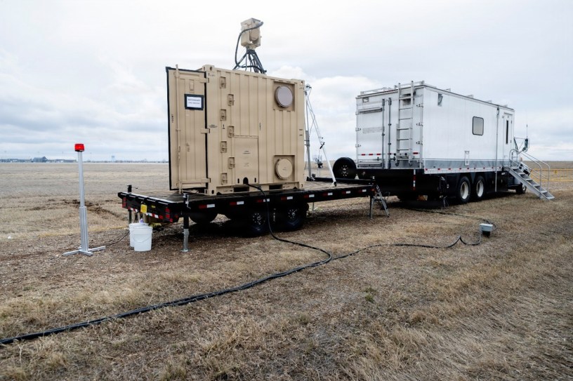 Boeing's laser system intended for dual-use in power beaming and aerial defense sits in the field for testing. The U.S. Naval Research Laboratory works with Boeing and the U.S. Army in testing the capability of a dual-use laser systems. (U.S. Navy photo by Jonathan Steffen-Arnold)