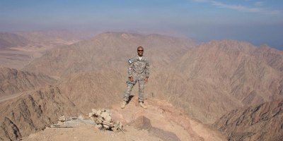 U.S. Army Sgt. Robert McLymore stands atop a mountain in Egypt while on deployment in 2012. McLymore was recently awarded the prestigious Soldier's Medal for actions he took assisting first responders in saving a trapped motorist from a burning car after an accident in 2015.