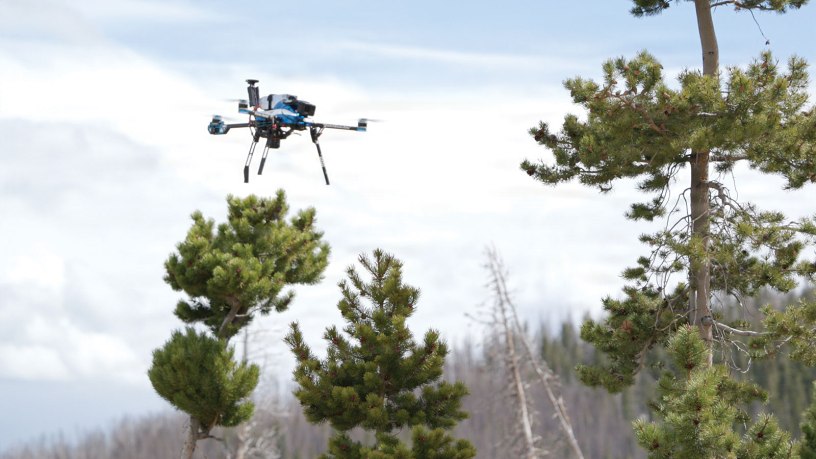 A Forest Service uncrewed aircraft system flies above the Cameron Peak Fire burn area in the Roosevelt National Forest in northern Colorado, April 9, 2026.