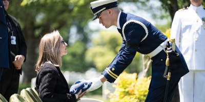 Coast guardsmen from the U.S. Coast Guard Ceremonial Honor Guard, sailors from the U.S. Navy Ceremonial Band, and soldiers from the 3d U.S. Infantry Regiment (The Old Guard) Caisson Detachment conduct full military funeral honors with escort during a memorial service for U.S. Merchant Marine Galleyman-Utility Jose Pabon, Arlington National Cemetery, Arlington, Virginia, May 12, 2026.