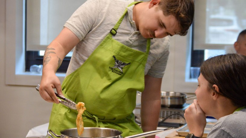The Colonel's Kitchen paired Fort Belvoir recovering Soldiers with experienced chefs to teach foundational cooking techniques, nutritional awareness and meal preparation at USO Warrior and Family Center, June 17, 2026. This event marked the latest interaction in the ongoing partnership. with Soldier Recovery Unit and Army Community Services.