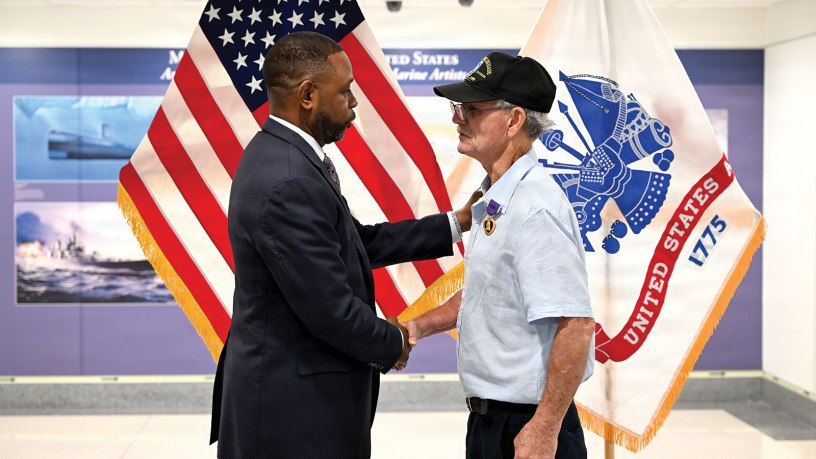 The Purple Heart award is presented to U.S. Army Spc. 4 Raymond S. Williams during a ceremony at the Pentagon, Arlington, Virginia, June 17, 2026. Phillip Churn Sr., Army Reserve Ambassador hosted this event.