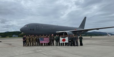 U.S. Air Force Airmen assigned to the 730th Air Mobility Squadron, Yokota Air Base, pose for a photo with members of the Japan Self-Defense Force in Fukuoka, Japan, June 24, 2026, in support of VALIANT SHIELD 2026.