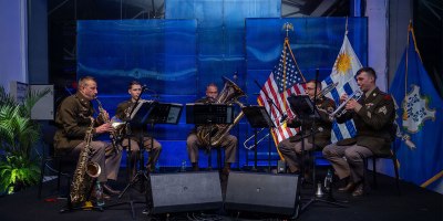 A quintet from the 102nd Army Band, Connecticut Army National Guard performs at an America 250 celebration in Montevideo, Uruguay on June 25, 2026. The performance marked the Connecticut Army National Guard band's first appearance in Uruguay and took place before senior U.S. and Uruguayan leaders during the nation's America 250 commemoration. (U.S. Air National Guard photo by Staff Sgt. Emme Drummond)