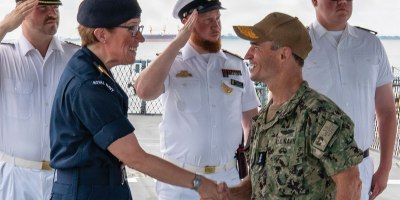 Vice Adm. Doug Perry, commander, U.S. 2nd Fleet, greets Commodore Maryla Ingham, commander, standing NATO Maritime Group 1, during a visit to German navy Sachsen-class air-defense frigate FGS Sachsen (F 219), at Naval Station Norfolk, June 29, 2026.