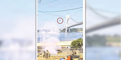 Screenshot shown from Instagram of the squirrel mid‑jump. A viral moment at U.S. Army Garrison Fort Hamilton on July 2, shows a squirrel leaping from a utility pole onto a Soldier during a ceremonial cannon salute for Sail4th 250, July 4, 2026. The clip, filmed by Public Affairs Chief Susan Blair, has surpassed 9.1 million views on Instagram. (U.S. Army photo from Fort Hamilton Instagram Page)