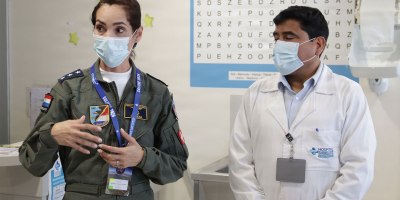 A Paraguayan air force representative participating in Exercise Salitre 2026 speaks with a representative from Hospital Regional de Antofagasta during a tour of the hospital’s pediatric wing in Antofagasta, Chile, July 6, 2026.