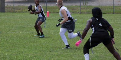 U.S. Army 1st Lt. Brittany Gardner, a strength manager assigned to the 4th Psychological Operations Group (Airborne), preps to throw football during the All-Army Flag Football Selection Camp at Fort Jackson, South Carolina, July 09, 2026.