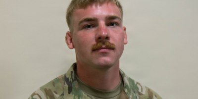 U.S. Army Spc. Boecker, an infantryman assigned to the Minnesota National Guard's Moorhead-based 2nd Combined Arms Battalion, 136th Infantry Regiment, stands for a photo in Elk River, Minnesota, July 11, 2026.