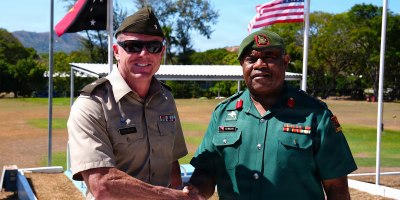 .S. Army BG. Brion J. Aderman Commander of the Wisconsin Army National Guard and Col. Bruno Malau, head of the Coordination Branch from the Papua New Guinea Defence Force shake hands after the opening ceremony of Exercise Tamiok Strike 26 at Murray Barracks, Port Moresby, Papua New Guinea, July 13, 2026.