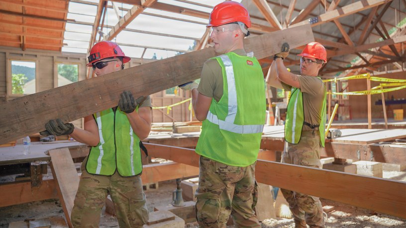 U.S. Air Force Airmen assigned to the 201st Rapid Engineer Deployable Heavy Operational Repair Squadron Engineers, Pennsylvania Air National Guard, install floor joists during an Innovative Readiness Training project at Redwood National and State Parks near Orick, California, July 13, 2026.