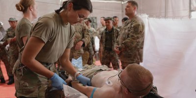 Soldiers from 709th Medical Company Area Support, Illinois National Guard run a practice blood draw during a demonstration of a simulated blood infusion as part of Exercise Keris Strike 26 near Kota Belud, Malaysia, July 17, 2026.