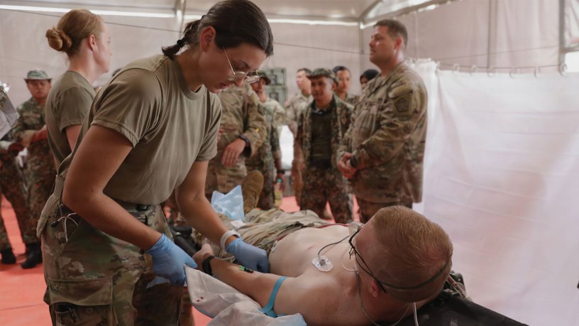 Soldiers from 709th Medical Company Area Support, Illinois National Guard run a practice blood draw during a demonstration of a simulated blood infusion as part of Exercise Keris Strike 26 near Kota Belud, Malaysia, July 17, 2026.