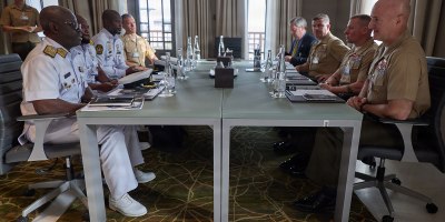 Key leaders from the Ghana Navy, left, and key leaders with U.S. Marine Corps Forces, Europe and Africa, right, sit together in Rabat, Morocco, July 21, 2026.