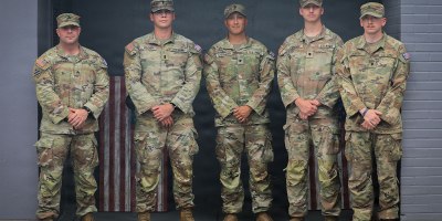 (From the left) Sgt. Louis Ferdinando, 1st Lt. Jacob Wagner, Spc. Fredie Cerrano, Spc. Brayden Cundiff, and Spc. Ryan Austin, all with the Georgia Army National Guard, U.S. Army, assigned to Joint Task Force-District of Columbia (JTF-DC) in support of the D.C. Safe and Beautiful mission, pose for a photo in Arlington, V.A., July 21, 2026.