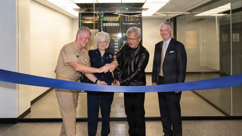 U.S. Navy Adm. Samuel J. Paparo, commander, U.S. Pacific Command; retired U.S. Navy Vice Adm. Ann E. Rondeau, president of the Naval Postgraduate School (NPS); Jensen Huang, founder and CEO of NVIDIA; and Hank Plain, board chair of the Naval Postgraduate School Foundation, cut a ribbon to mark the commissioning of the NVIDIA DGX GB300 AI supercomputer at NPS in Monterey, California, July 22, 2026.