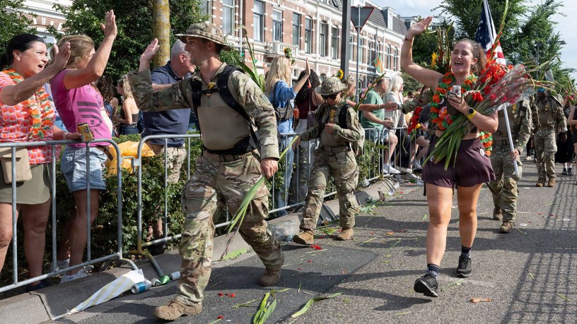 U.S. Air Force Capt. Michael Hubbard, 39th Weapons System Security Group executive officer, high-fives spectators along the route of the 108th International Four Days Marches in Nijmegen, Netherlands, July 24, 2026.