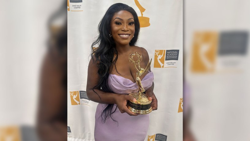 U.S. Air Force Staff Sgt. Tabitha Awoniyi, a Commander's Support Staff member with the 442d Force Support Squadron, 442d Fighter Wing, holds her regional Emmy Award in Louisville, Ky., July 25, 2026.