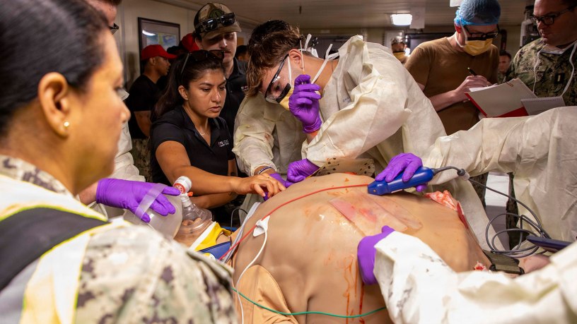 Sailors assigned to the Expeditionary Medical Unit (EMU-2) perform needle thoracostomy on a medical dummy during an Operational Readiness Evaluation (ORE) aboard the expeditionary fast transport ship USNS Point Loma (T-EPF 15), July 25, 2026.