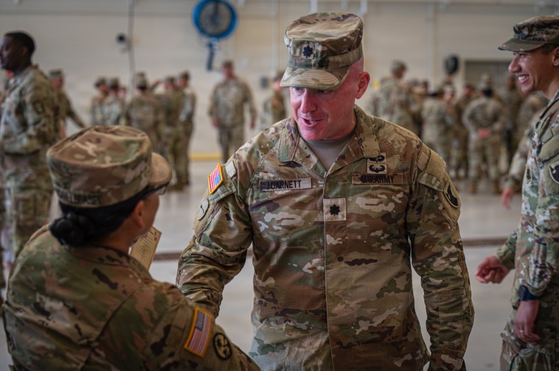 U.S. Army Lt. Col. Christopher Garnett, the outgoing commander of Task Force Talon, shakes hands with a Soldier during a change of command ceremony on Andersen Air Force Base, Guam, July 1, 2026. The ceremony marked a deliberate and ceremonial transfer of leadership, ensuring continuity of command and stewardship of the unit's legacy. (U.S. Army photo by Sgt. Dustin Stark)