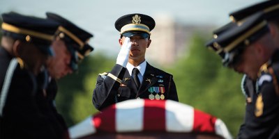 Soldiers from the 3d U.S. Infantry Regiment (The Old Guard), the U.S. Army Band, “Pershing’s Own” and the U.S. Army’s 3d U.S. Infantry Regiment (The Old Guard) Caisson Detachment conduct full military funeral honors with escort for U.S. Army Sgt. DeLoren Dage in Section 57 of Arlington National Cemetery, Arlington, Virginia, July 14, 2026.