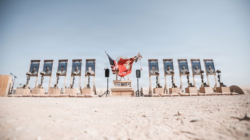 Ten battlefield crosses stand in honor of fallen Marines with 2nd Battalion, 1st Marine Regiment, 1st Marine Division, during a memorial ceremony at Prince Sultan Air Base, Kingdom of Saudi Arabia, Sept. 12, 2021.