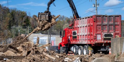 Crews load and transport debris from downtown Old Fort to a U.S. Army Corps of Engineers Temporary Debris and Reduction Site in McDowell County, Oct. 31, 2024.