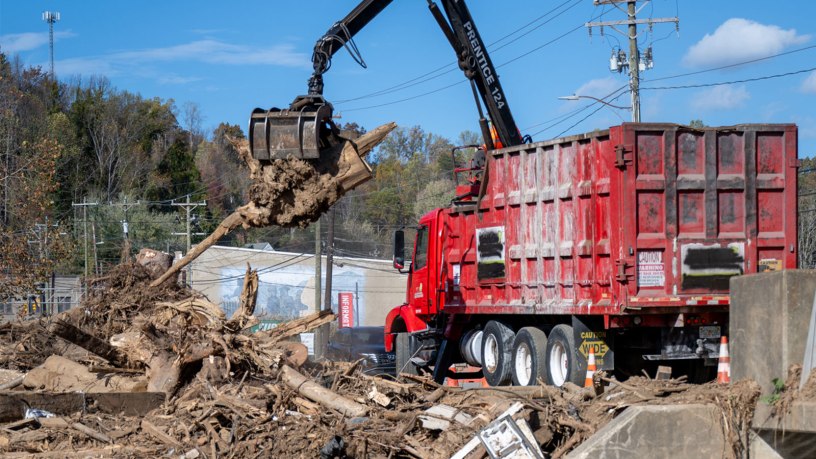 Crews load and transport debris from downtown Old Fort to a U.S. Army Corps of Engineers Temporary Debris and Reduction Site in McDowell County, Oct. 31, 2024.