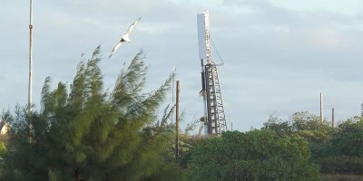 A sounding rocket towers over a launch site on Wake Island in the Pacific Ocean ahead of the Feb. 12 Space Measurement of a Rocket-released Turbulence (SMART) mission, which the Naval Research Laboratory managed.