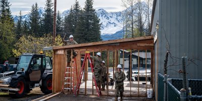 U.S. Air National Guard Senior Airman Edwin Carrillo, a structures specialist assigned to the 103d Civil Engineering Squadron, swings a hammer during the demolition of a building during a two-week National Guard Bureau deployment for training in Seward, Alaska, June 2, 2026.