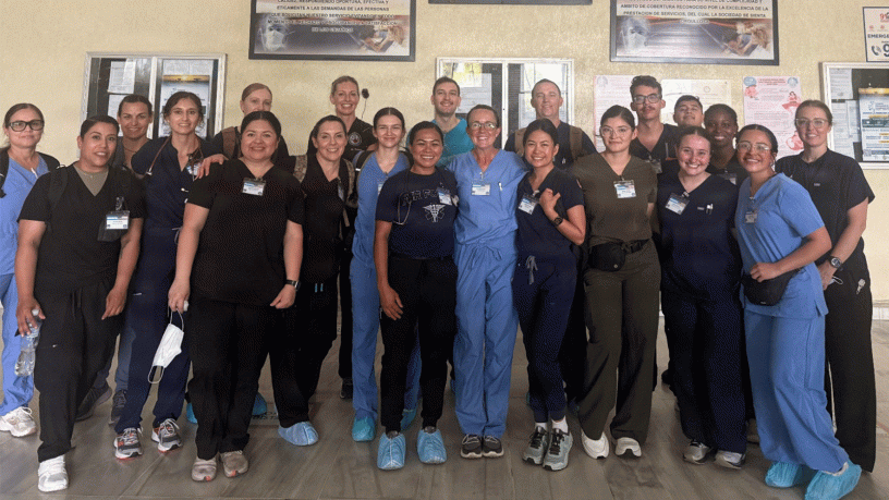 U.S. Airmen assigned to the 944th Aeromedical Staging Squadron and Honduran medical professionals pose for a group photo at Hospital Mario Catarino Rivas during a Medical Readiness Training Exercise in San Pedro Sula, Honduras.