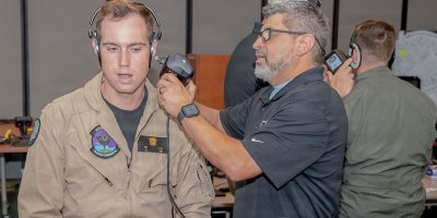 Lt. j.g. Richard Irving, a student naval aviator assigned to the “Stingrays” of (VT) 35, receives an ear-mapping scan during a digital ear scanning ear scan at Naval Air Station (NAS) Corpus Christi, Texas, July 15, 2026.