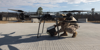 U.S. Marine Corps Cpl. Angel DepazValenzuela, a distribution specialist with Combat Logistics Battalion 5, Marine Rotational Force – Darwin 26, secures a cooler to a TRV-150 Tactical Resupply Unmanned Aerial System for a blood resupply rehearsal during Exercise Predator’s Run 26 at Townsville Field Training Area in Queensland, Australia, July 23, 2026. 